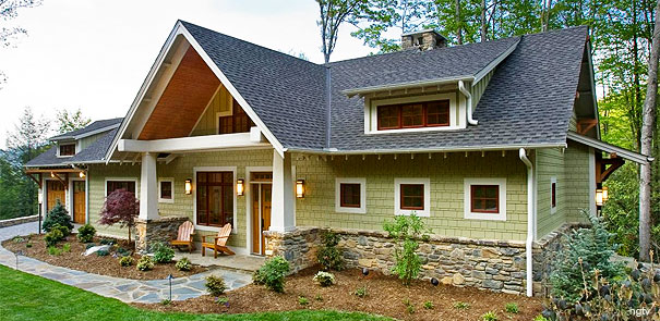 Typical Craftsman homes feature low-pitched rooflines, deep overhanging eaves, and tapered front columns.