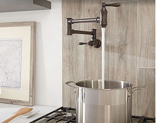 Pot filler faucets eliminate having lug heavy pots of water from the sink to the stove.