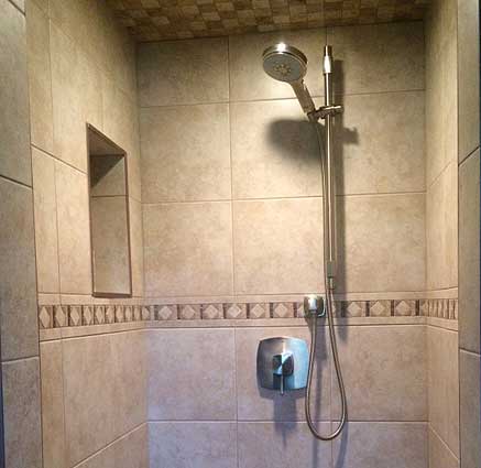A Grohe handshower set installed in the new shower.